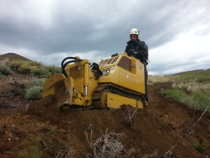 IMBA Trail Soutions Proiject Manager Alex Harrington operating Sutter 300.